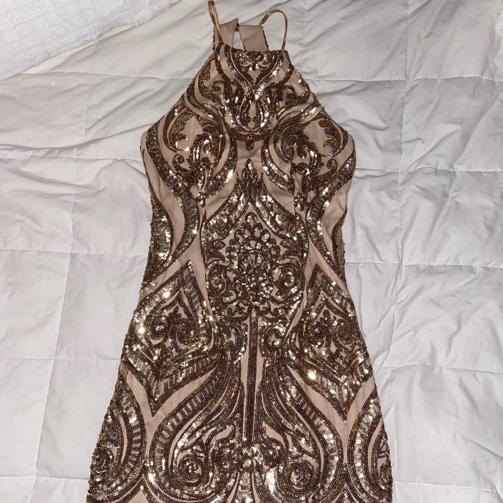 Gold dress worn for homecoming once.